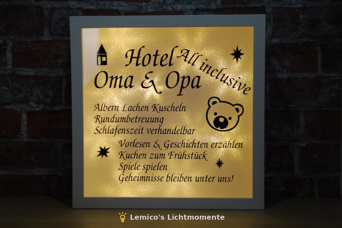 Beleuchteter Bilderrahmen mit Hotel-Motiv, Glimmerfolie und weißes Licht